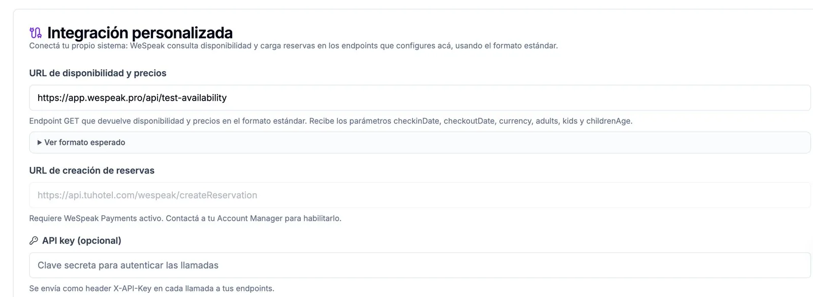 La sección Integración personalizada del panel: la URL de disponibilidad y precios, la URL de creación de reservas y la API key